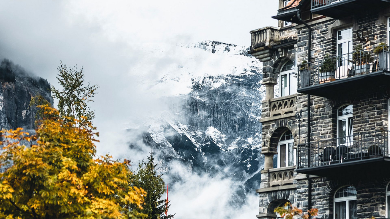 Mountain building. Китайское здание в горах. Здание в горах. Серое высокое узкое одинокое здание в горах.