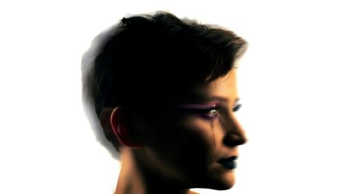 Artistic Silhouette Portrait with Purple Makeup 4K Wallpaper