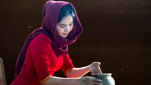 Woman Sculpting Clay Pottery Traditional Style 4K Wallpaper