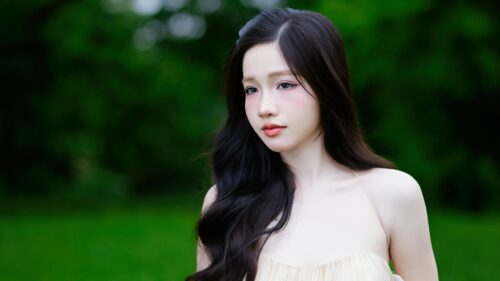 Stunning Asian Woman with Long Wavy Hair 4K Desktop Wallpaper