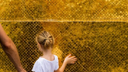 Child Touching Golden Mosaic Wall Travel Inspiration 4K Wallpaper