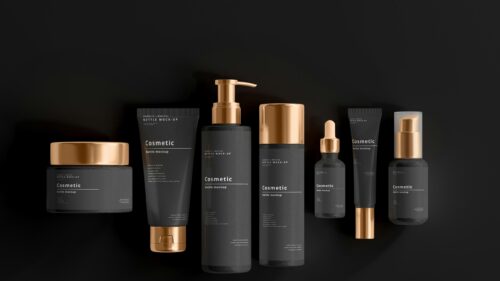 Luxury Matte Black and Gold Cosmetic Bottles 4K Desktop Wallpaper