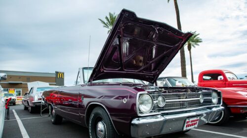 Classic Purple Muscle Car at Car Show 4K Wallpaper