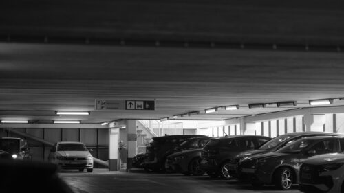 Black and White Cinematic Underground Parking Garage 4K Wallpaper