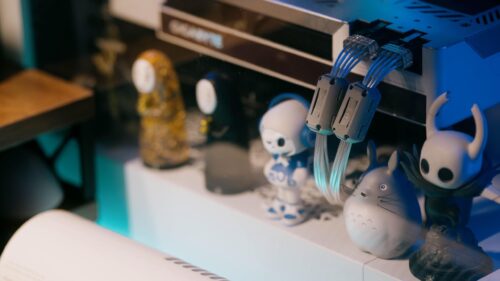 Anime Figurines and Tech Setup Gaming Aesthetic 4K Wallpaper