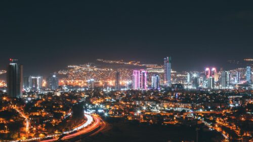 Stunning Night Cityscape with Illuminated Skyscrapers 4K Desktop Wallpaper
