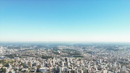 Breathtaking Aerial Cityscape Overlooking Urban Skyline 4K Wallpaper