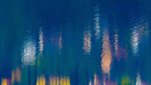 Abstract Rippling City Light Reflections on Water 4K Wallpaper