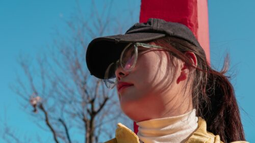 Stylish Young Woman in Hat and Glasses Portrait Desktop Wallpaper