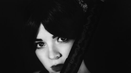 Mysterious Woman with Katana Blade Black and White Desktop Wallpaper
