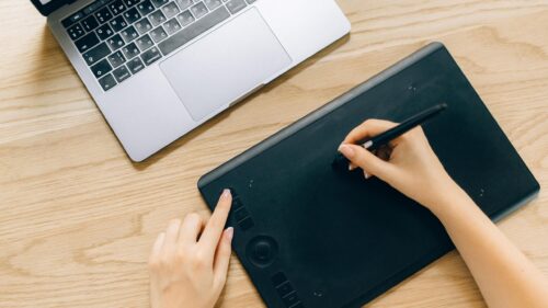 Graphic Designer Workspace with Digital Pen and Laptop PC Wallpaper