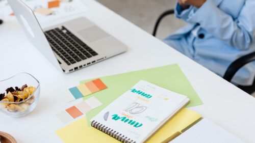 Creative Office Desk with Laptop and Design Sketch 4K Desktop Wallpaper
