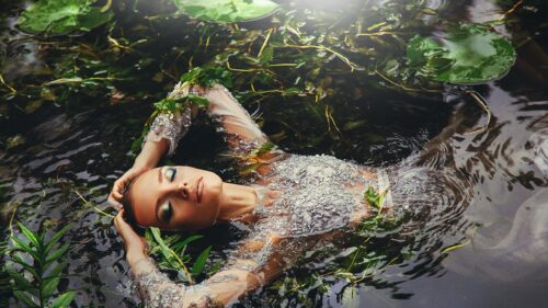 Ethereal Nymph in Enchanted Forest Pond 4K Desktop Wallpaper