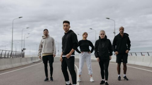 Group of Friends Posing in Streetwear Fashion 4K Desktop Wallpaper
