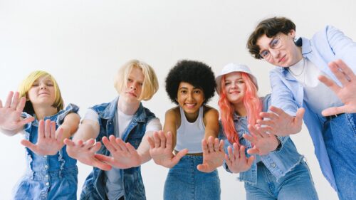 Group of Stylish Diverse Friends Reaching Out High Quality PC Wallpaper