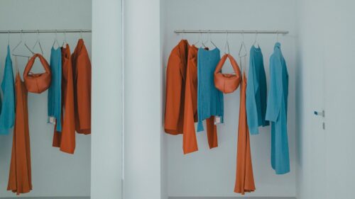 Minimalist Fashion Clothing Rack with Orange and Blue Aesthetic Desktop Wallpaper
