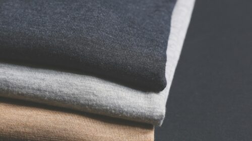 Minimalist Stack of Folded Fabric Textures 4K Desktop Wallpaper