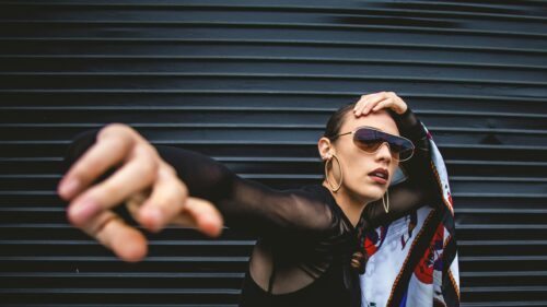 Chic Fashion Model with Sunglasses and Scarf 4K Desktop Wallpaper