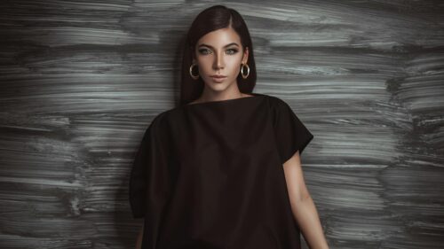 Elegant Woman in Minimalist Black Fashion 4K Desktop Wallpaper