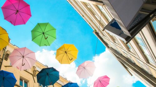 Colorful Hanging Umbrellas Under Clear Blue Sky Desktop Wallpaper