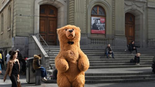 Surreal Street Photography with Teddy Bear Mascot 4K Wallpaper