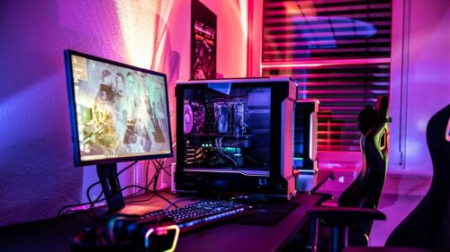 Ultimate Gaming Setup with Neon RGB Lights 4K Desktop Wallpaper