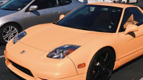 Stunning Peach Acura NSX Sportscar Front View 4K Wallpaper