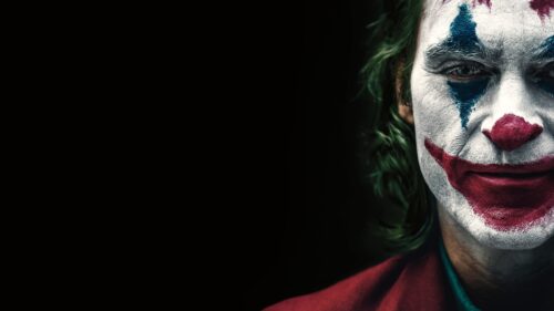 Dark Cinematic Joker Smiling Close Up High Resolution 4K Desktop Wallpaper