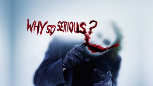 Dark Cinematic Joker Smiling Amidst Chaos High Resolution 4K Desktop Wallpaper