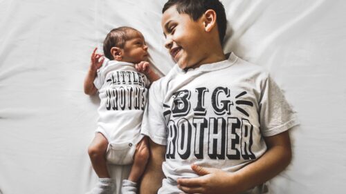 Heartwarming Illustration of a Little Brother Walking Hand in Hand with Big Sister 4K Desktop Wallpaper