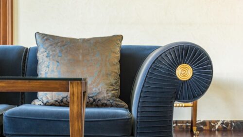 Elegant Blue Velvet Sofa with Gold Accent Luxury Interior Desktop Wallpaper