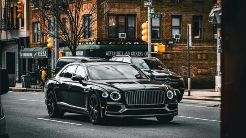 Black Bentley Flying Spur Luxury Sedan in New York City 4K Wallpaper