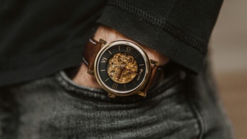 Elegant Skeleton Watch with Brown Leather Strap 4K Desktop Wallpaper