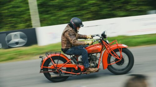 Classic Indian Motorcycle Racing on Track Desktop Wallpaper