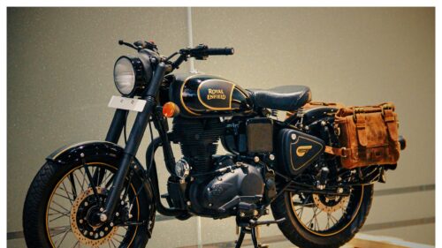 Classic Royal Enfield Black and Gold Motorcycle 4K Desktop Wallpaper