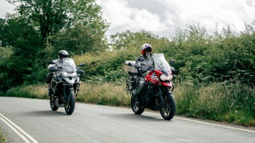 Two Adventure Motorcycles Touring on a Country Road 4K Wallpaper