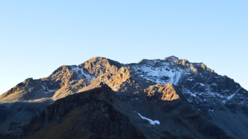 Stunning Golden Hour Snow Capped Alpine Peak 4K Wallpaper