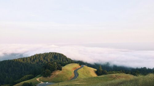 Winding Road Above the Clouds Mountain Landscape 4K Wallpaper
