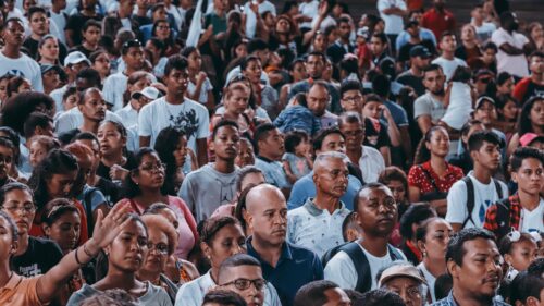 Crowd of Diverse People at a Large Gathering Desktop Wallpaper