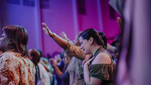 People Praying at Church Worship Service 4K Desktop Wallpaper