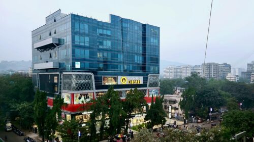 Modern Glass Architecture and Rajhans Cinemas Building Desktop Wallpaper