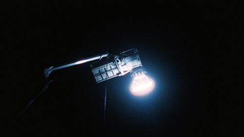 Cinematic Film Set Lighting Rig Against Dark Night Sky 4K Wallpaper