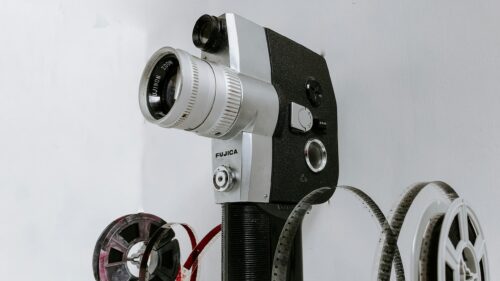 Vintage Fujica Film Camera with Cinema Reels Desktop Wallpaper