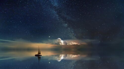 Sailboat under Milky Way and Thunderstorm Night Sky 4K Wallpaper