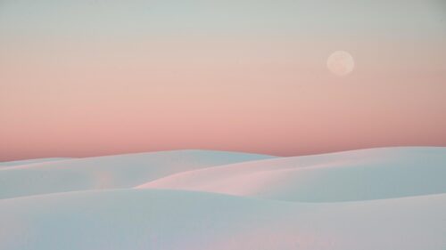 Minimalist White Sand Dunes with Full Moon at Sunset 4K Wallpaper
