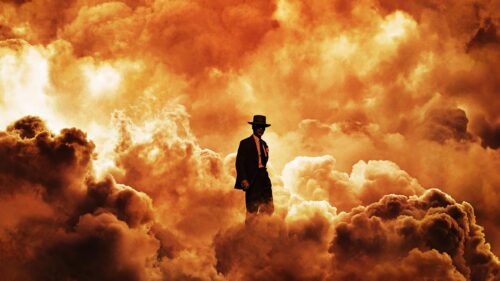 Cinematic J. Robert Oppenheimer Portrait with Dramatic Atomic Explosion Background 4K Desktop Wallpaper