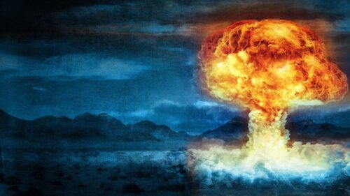 Cinematic J. Robert Oppenheimer Silhouette Against Atomic Explosion 4K Desktop Wallpaper