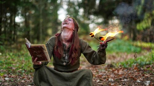 Mystical Sorceress Casting Fire Spells 4K Desktop Wallpaper