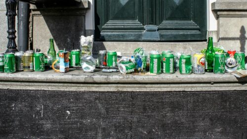 Messy Aftermath of a Party Heineken Beer Cans 4K Desktop Wallpaper