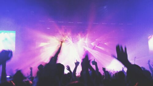 Vibrant Purple Concert Crowd Live Music Stage Desktop Wallpaper